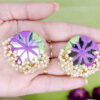 Purple green thread round mirror loreal
